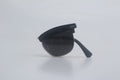 Classic black Clubmaster sunglasses featuring durable TR90 frames, polarized smoke lenses for glare reduction, and adjustable hinges, neatly folded against a minimalist white surface for men's and women's premium eyewear assortment, stylish sun blockers, full UV ray defense eyewear, timeless vintage vibes shades, upscale optic fashion items, beach-ready eye safeguard gear.